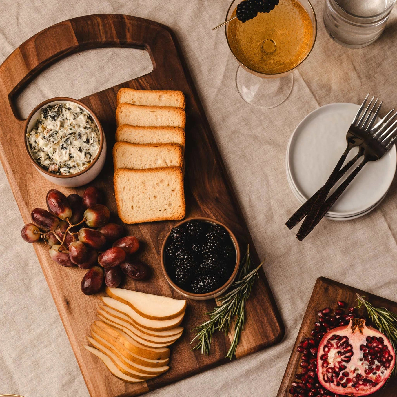 Walnut Oval Handled Cutting Board