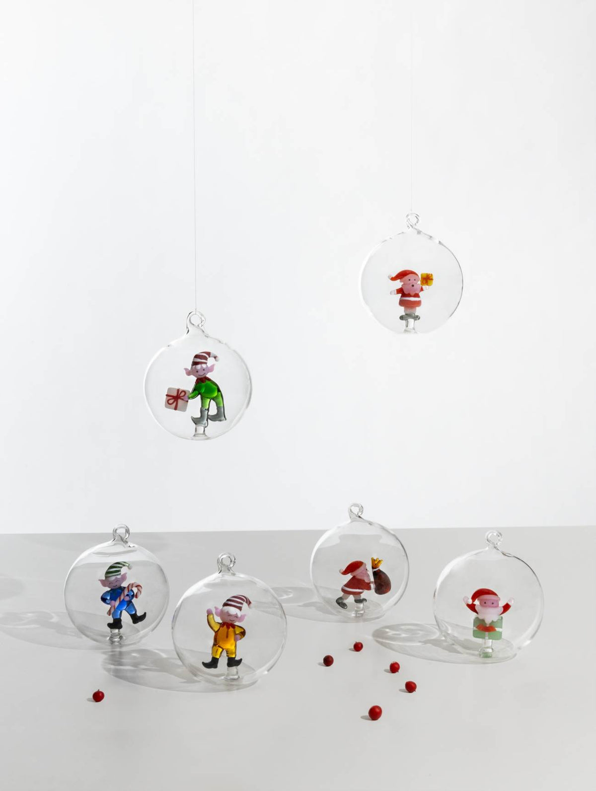 Ichendorf Green Elf with Gift Holiday Round Glass Ornament