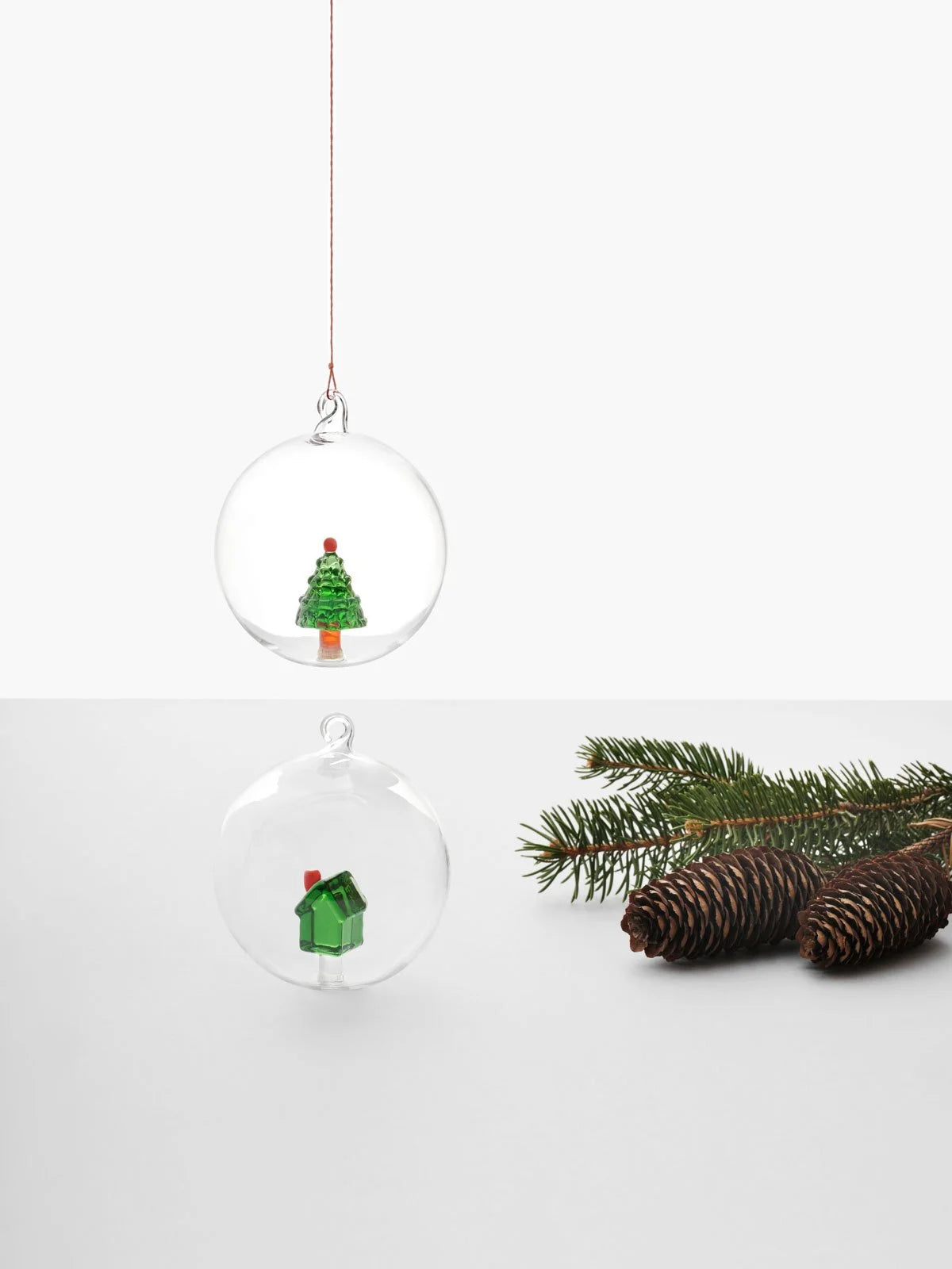 Ichendorf Green Elf with Gift Holiday Round Glass Ornament