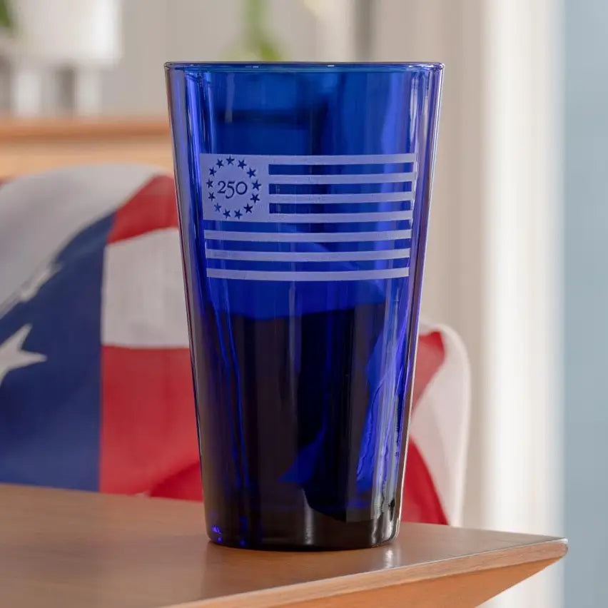 America250™ Betsy Ross Flag 17oz Cobalt Pint Glass